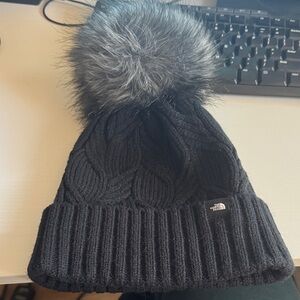The North Face Black Cable Knit Beanie with Gray Pom